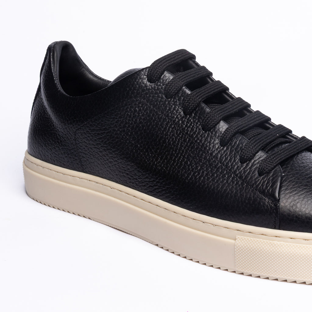 Sneakers in pelle bottolata